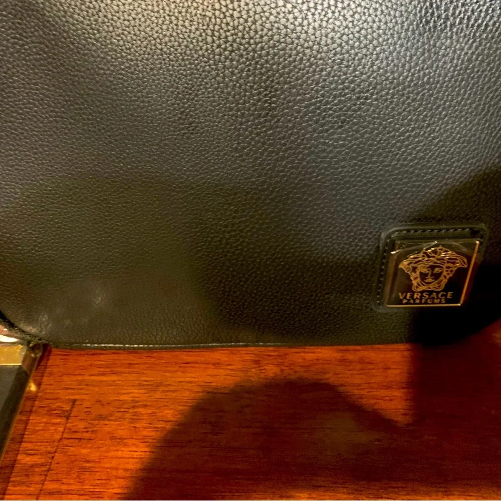 Brand new authentic cosmetic Versace case with 2 zipper compartments with handle